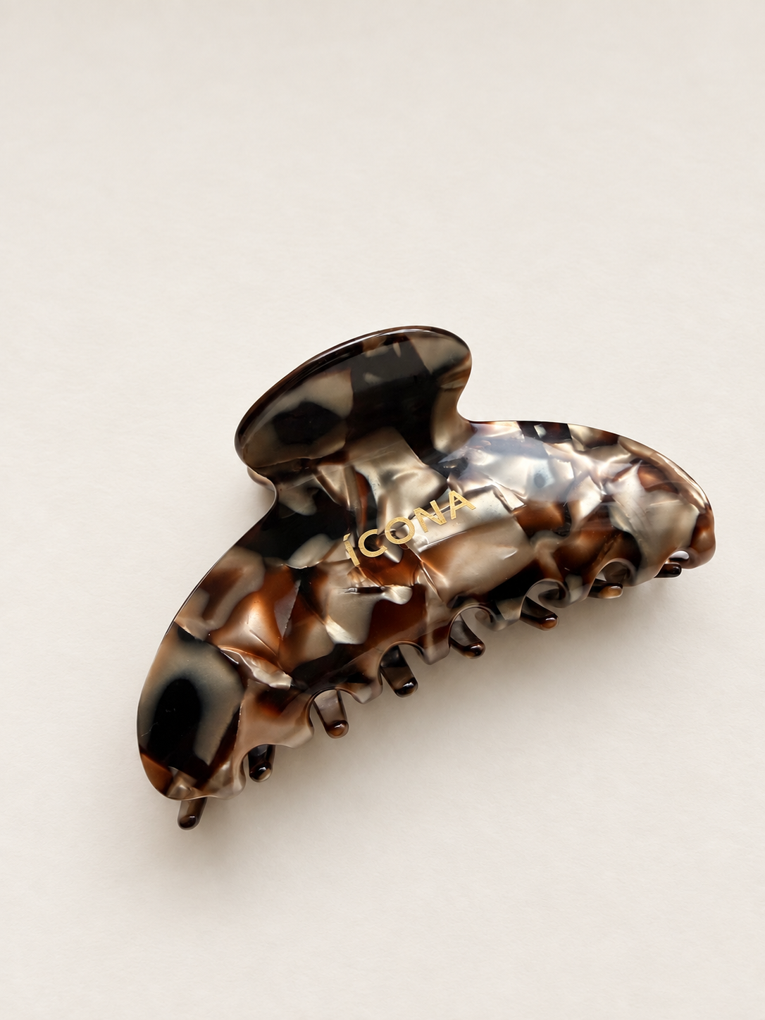The Signature Claw in Espresso Tortoise, from above