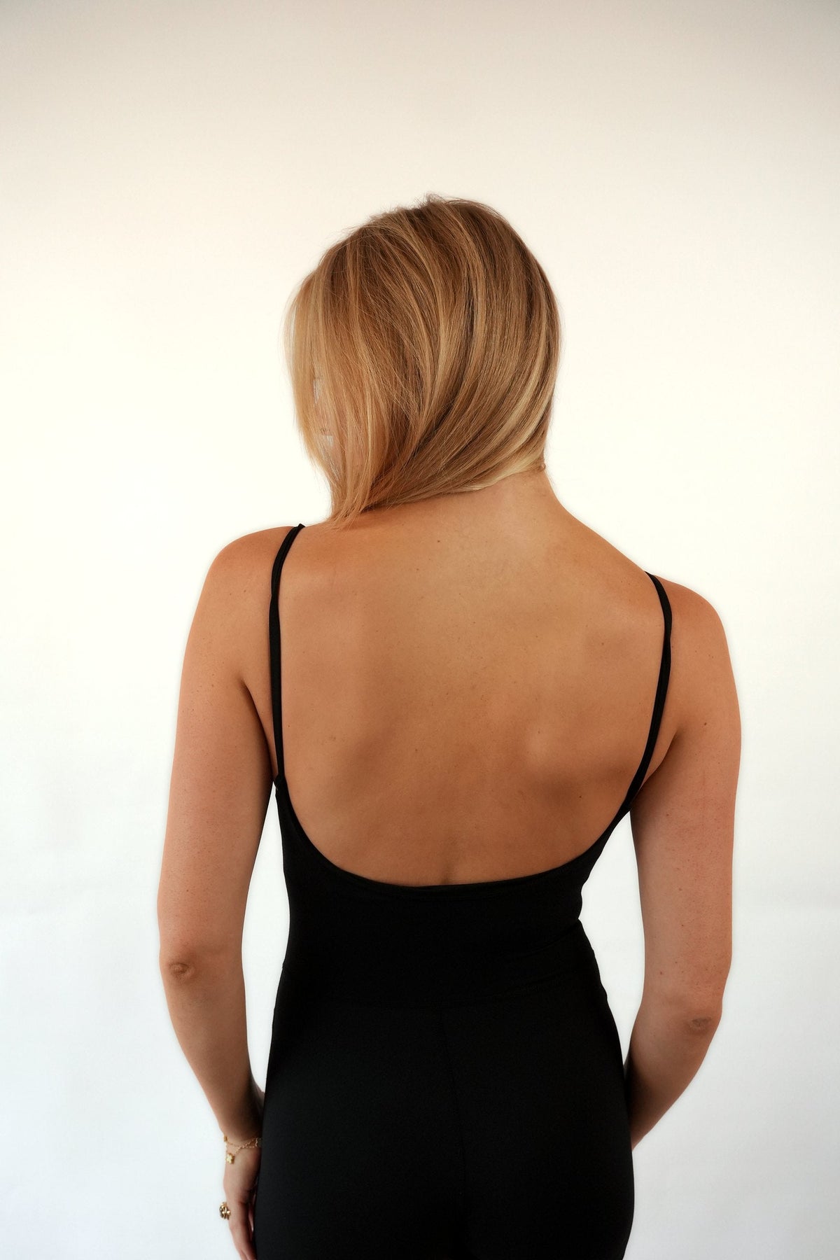 The Signature One Piece in Black, back view
